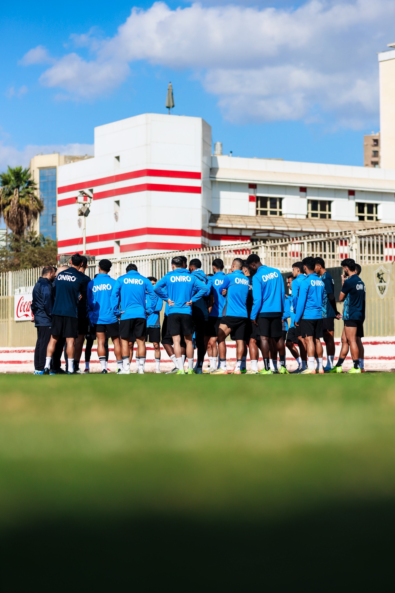 May be an image of 9 people, people playing soccer and text