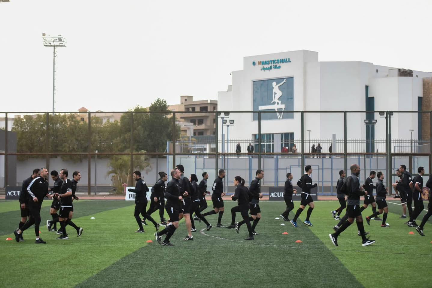 May be an image of 13 people, people playing football, people playing soccer and text